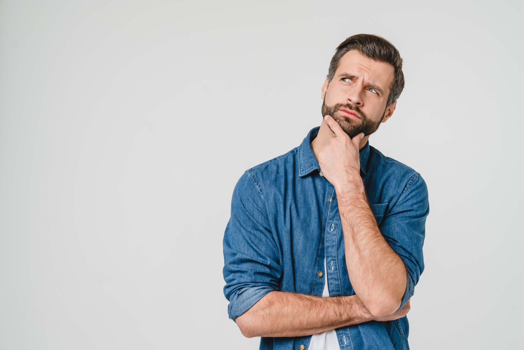 man wondering which decision to make